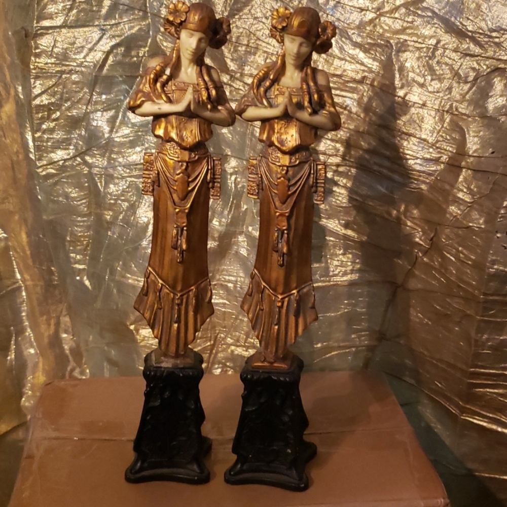 Praying woman statue